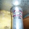 Foil tape was wrapped around the connections of the flue pipe; however, the tape is not approved for this use and should be removed.  Also, the double-walled flue pipe needs free airflow that would normally enter at the open bottom.  A greater problem exists in the last photo.  