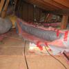 The insulation on this ducting in a Santa Rosa attic is allowing heat to escape into the attic.  While the air is not actually leaking out, the lack of insulation will allow heat loss.  The outer sheathing on the "wire-flex" ducting from the 1980s and 1990s did not hold up well in the heat.  