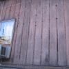 I guess this is what happens when you annoy a woodpecker.  I have never seen siding damage quite like this before.  With birds this aggressive, I would want to use a cement-fiber siding rather than wood.  But, I am not sure if even that would work.  