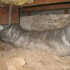 Crushed ducting in Petaluma.  Crushed ducting will restrict airflow and allow some rooms to be uncomfortably cool.  However, a larger problem is that the ducting is resting on the soil where it can get wet and allow water into the interior of the duct.  Ick!