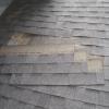 The shingles aren't going to do much good unless they are nailed-down.